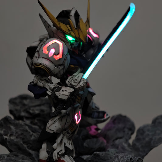 Bandai MGSD Barbatos Gundam – Battle-Worn Titan on Rock with LED Illumination